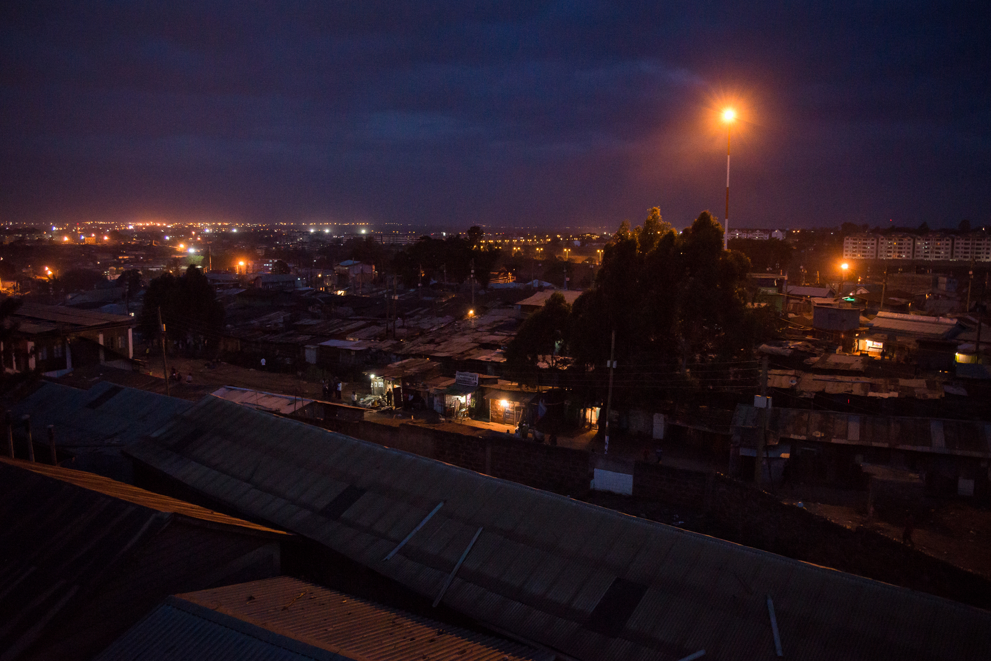 Night falls on Kibera, an informal settlement in Nairobi, Kenya. Much of the 2007/2008 post-election violence occurred in and around Kibera. Tonight, it is quiet. Night falls on Kibera, an informal settlement in Nairobi, Kenya. Much of the 2007/2008 post-election violence occurred in and around Kibera. Tonight, it is quiet.