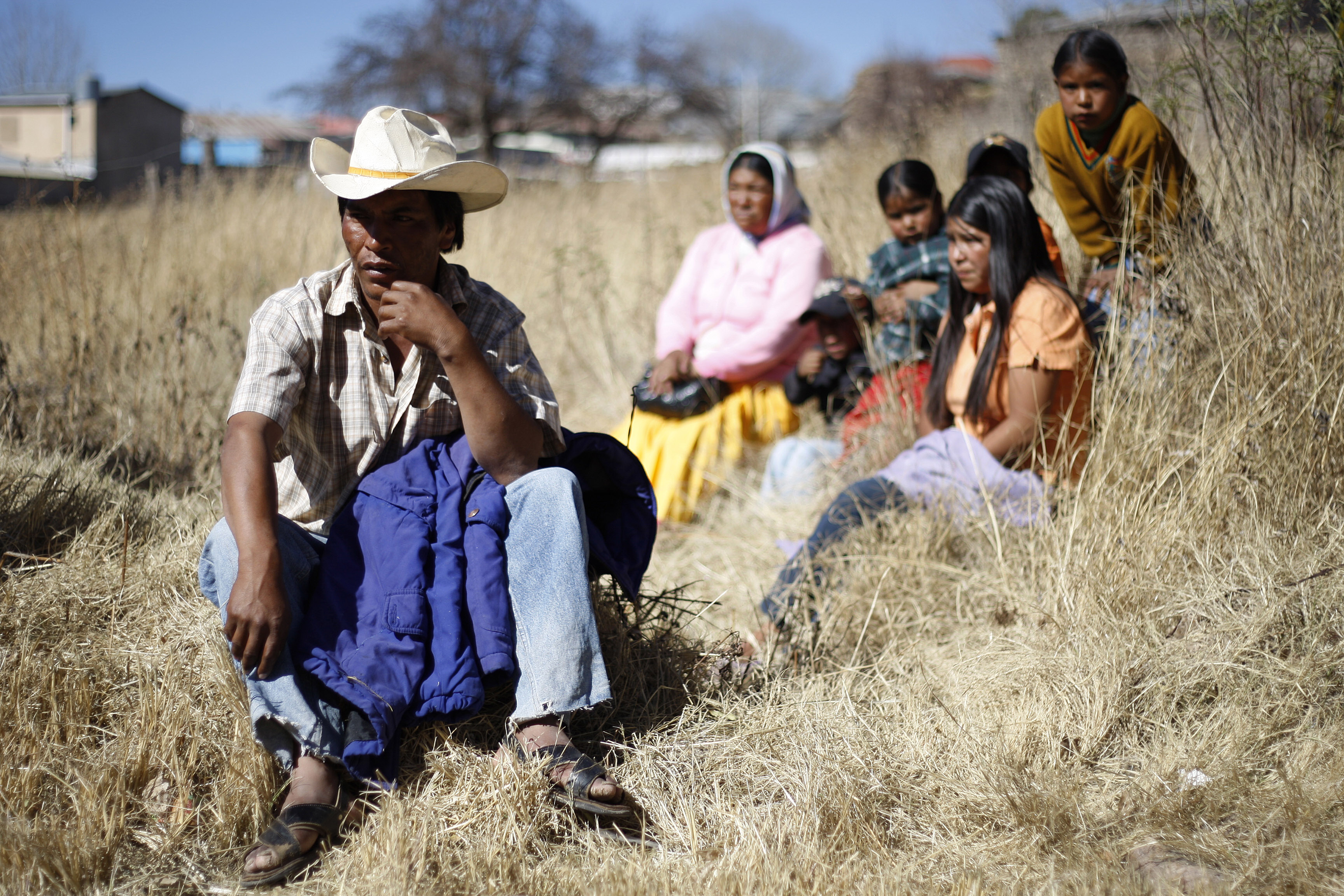 Tarahumara Indigenous family sits together in Guachochi November 30, 2011. Tarahumara Indigenous family sits together in Guachochi November 30, 2011.