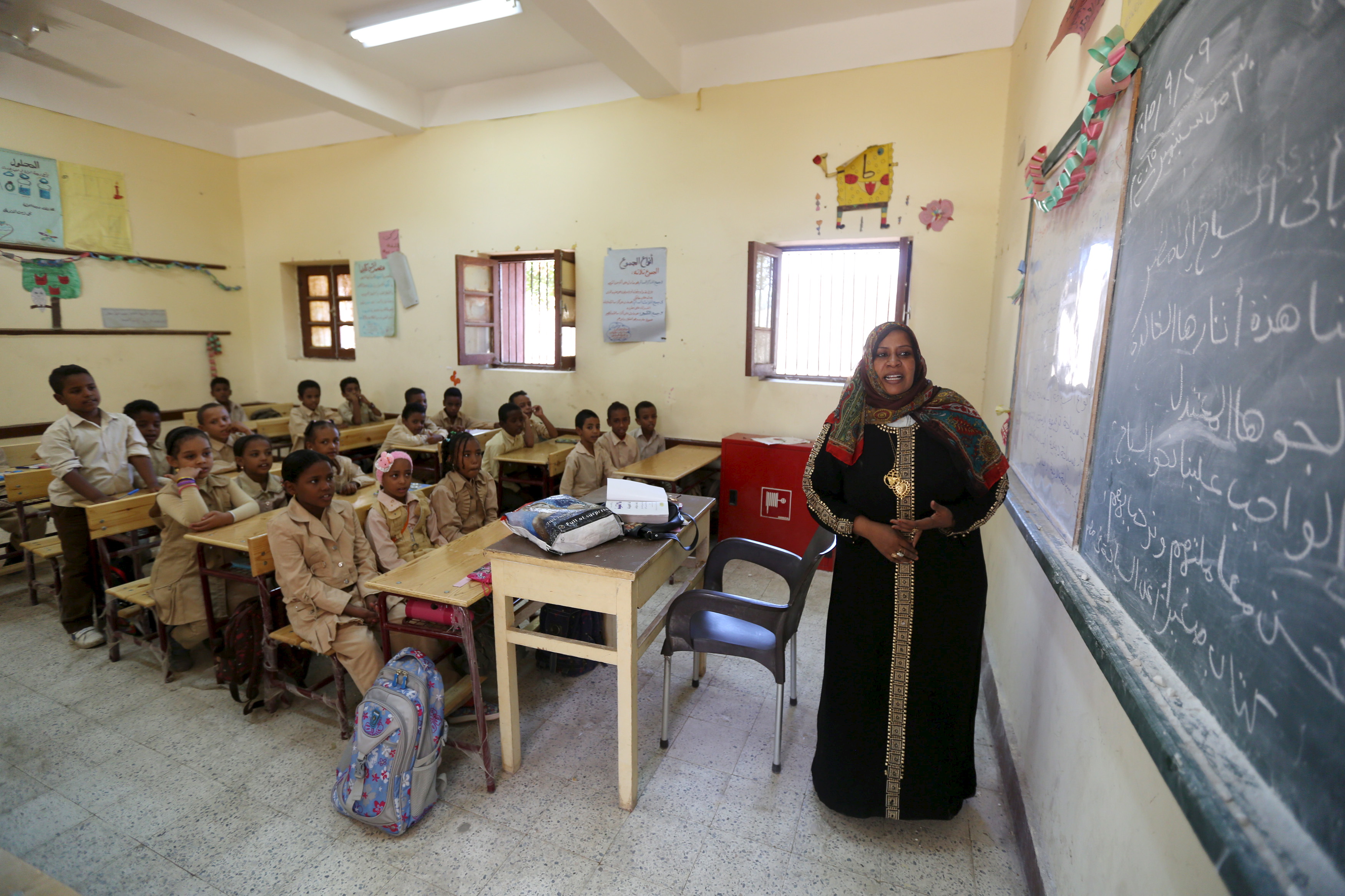 A teacher conducts a lesson at a school in the Nubian village of Adindan. A teacher conducts a lesson at a school in the Nubian village of Adindan.