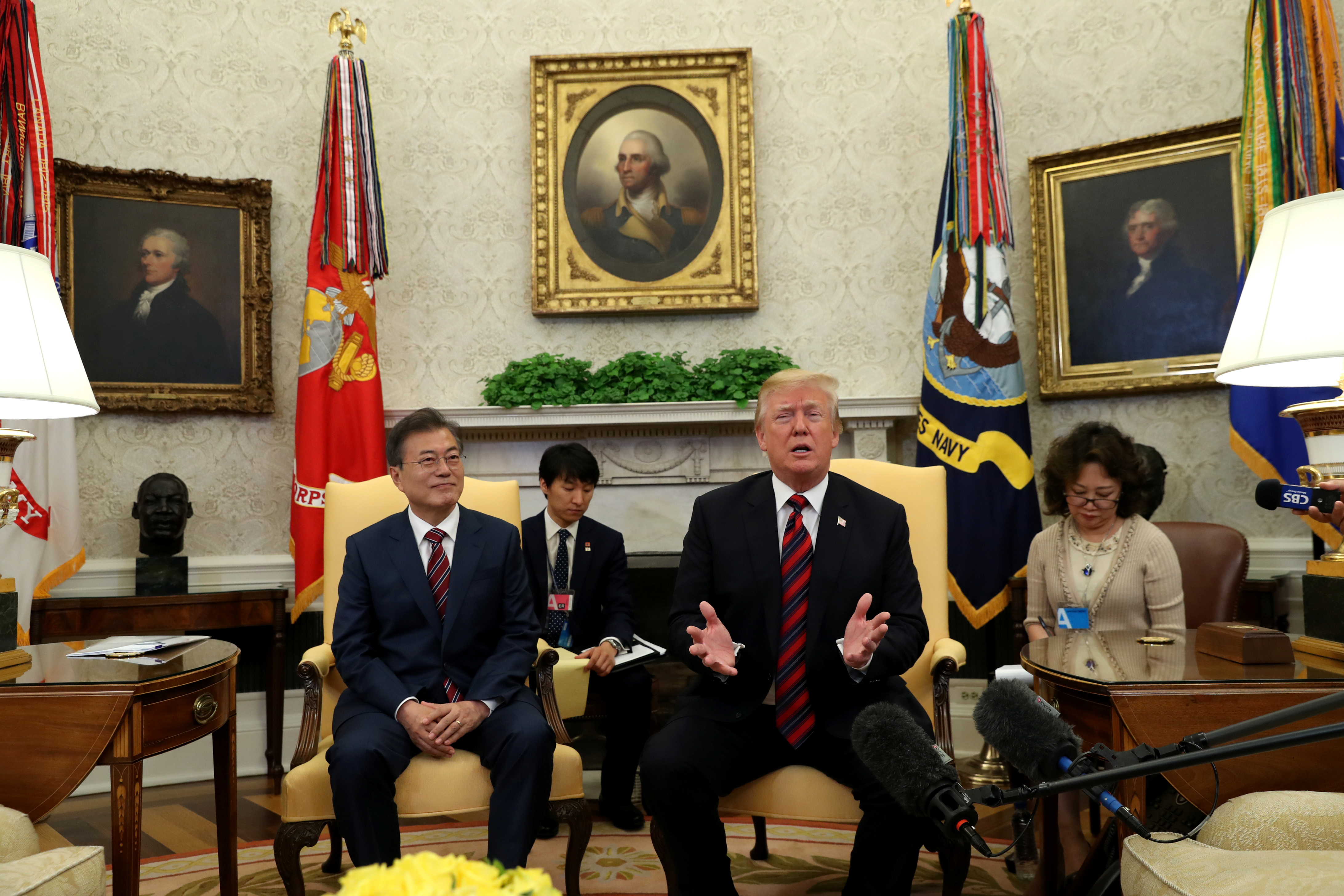 US President Donald Trump welcomes South Korea's President Moon Jae-In in the Oval Office of the White House in Washington, DC, May 22, 2018. US President Donald Trump sits beside South Korea's President Moon Jae-In in the Oval Office of the White House in Washington, DC, May 22, 2018.