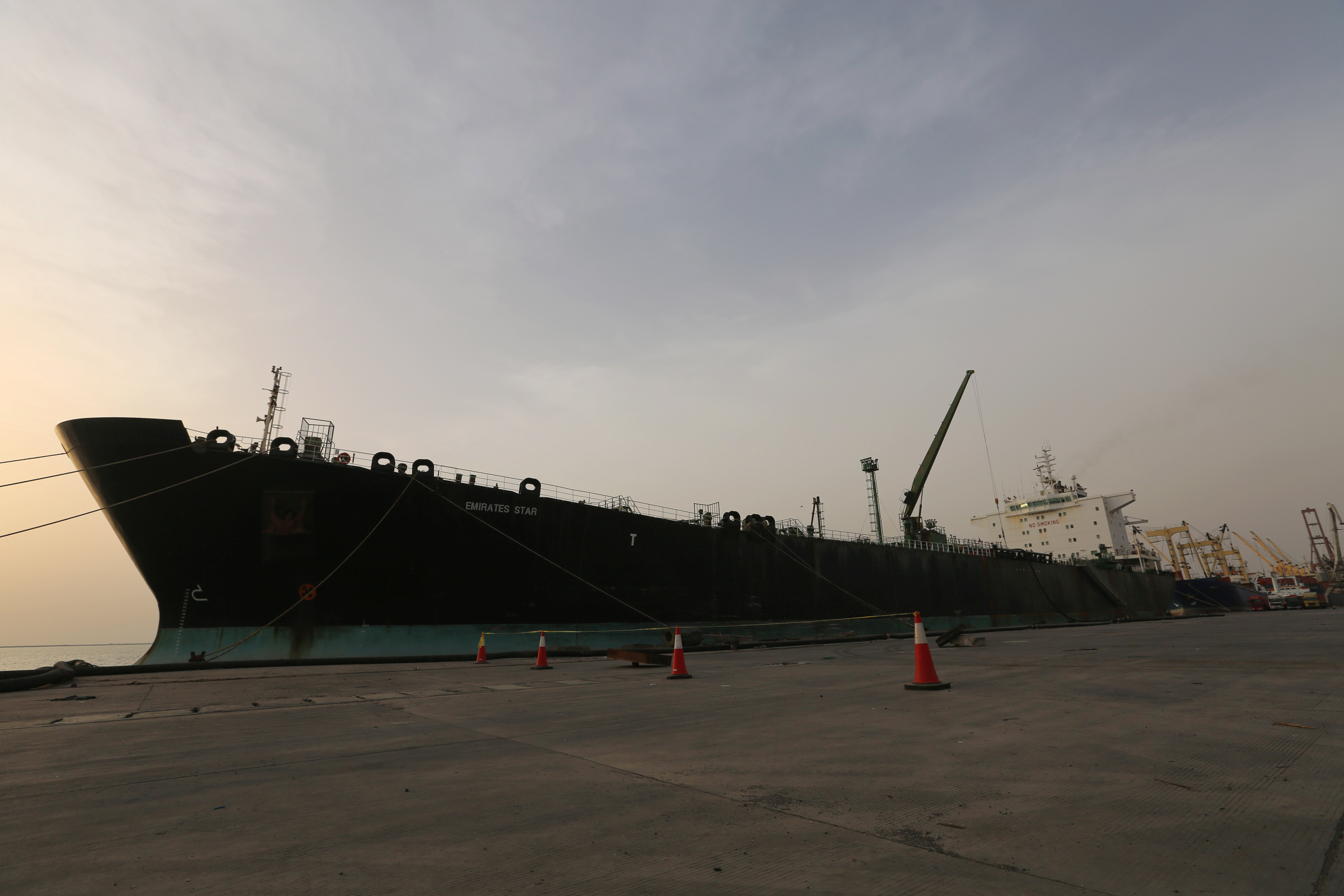 A cargo ship unloads a shipment of fuel at the Hodeida port, May 27, 2018. A cargo ship unloads a shipment of fuel at the Hodeida port, May 27, 2018.