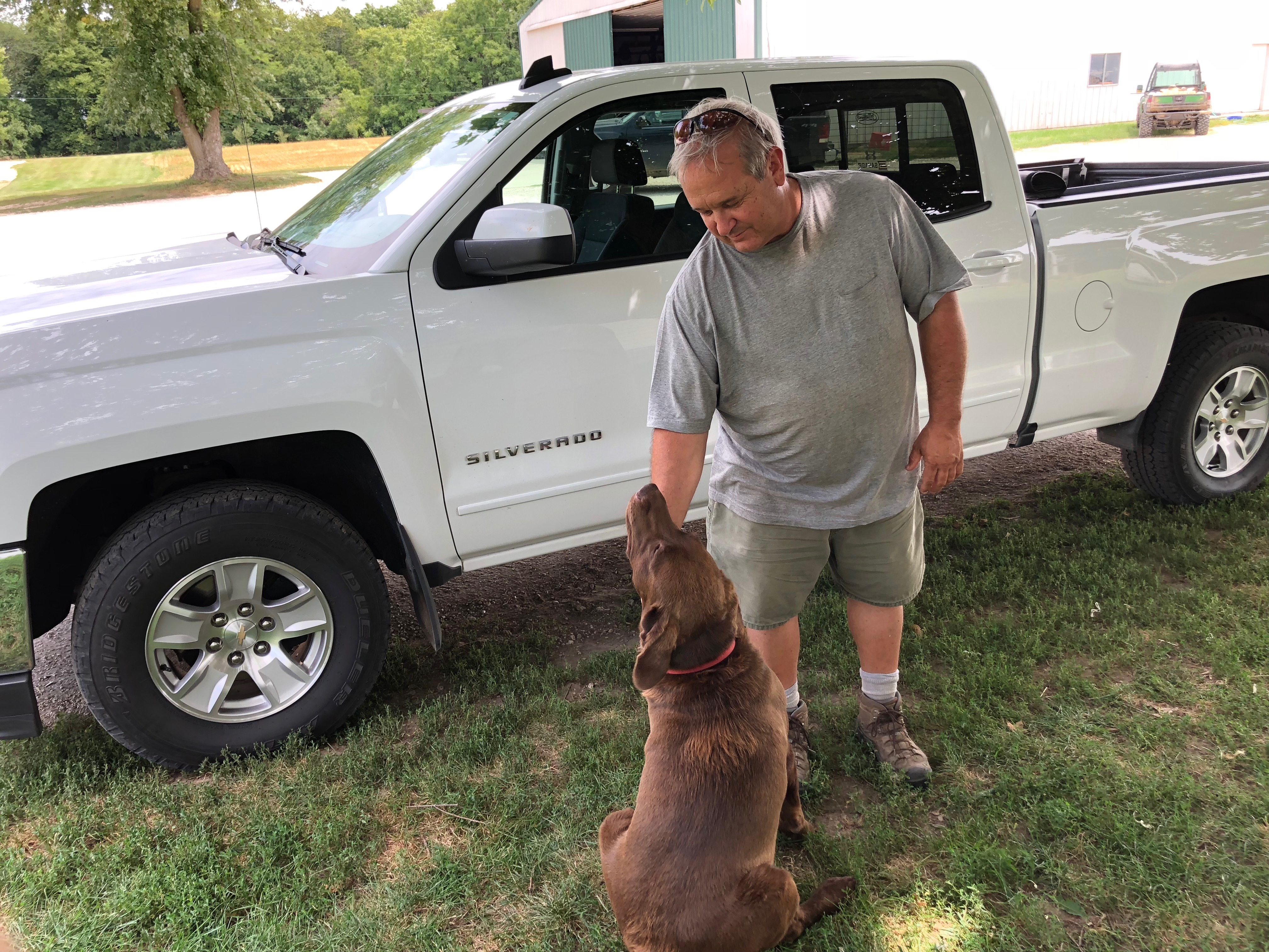 Farmer Dale Hadden and his dog Boomer. Hadden worries that if commodity prices stay depressed into next year, there will be an exodus of people farming in Illinois Farmer Dale Hadden and his dog Boomer. Hadden worries that if commodity prices stay depressed into next year, there will be an exodus of people farming in Illinois