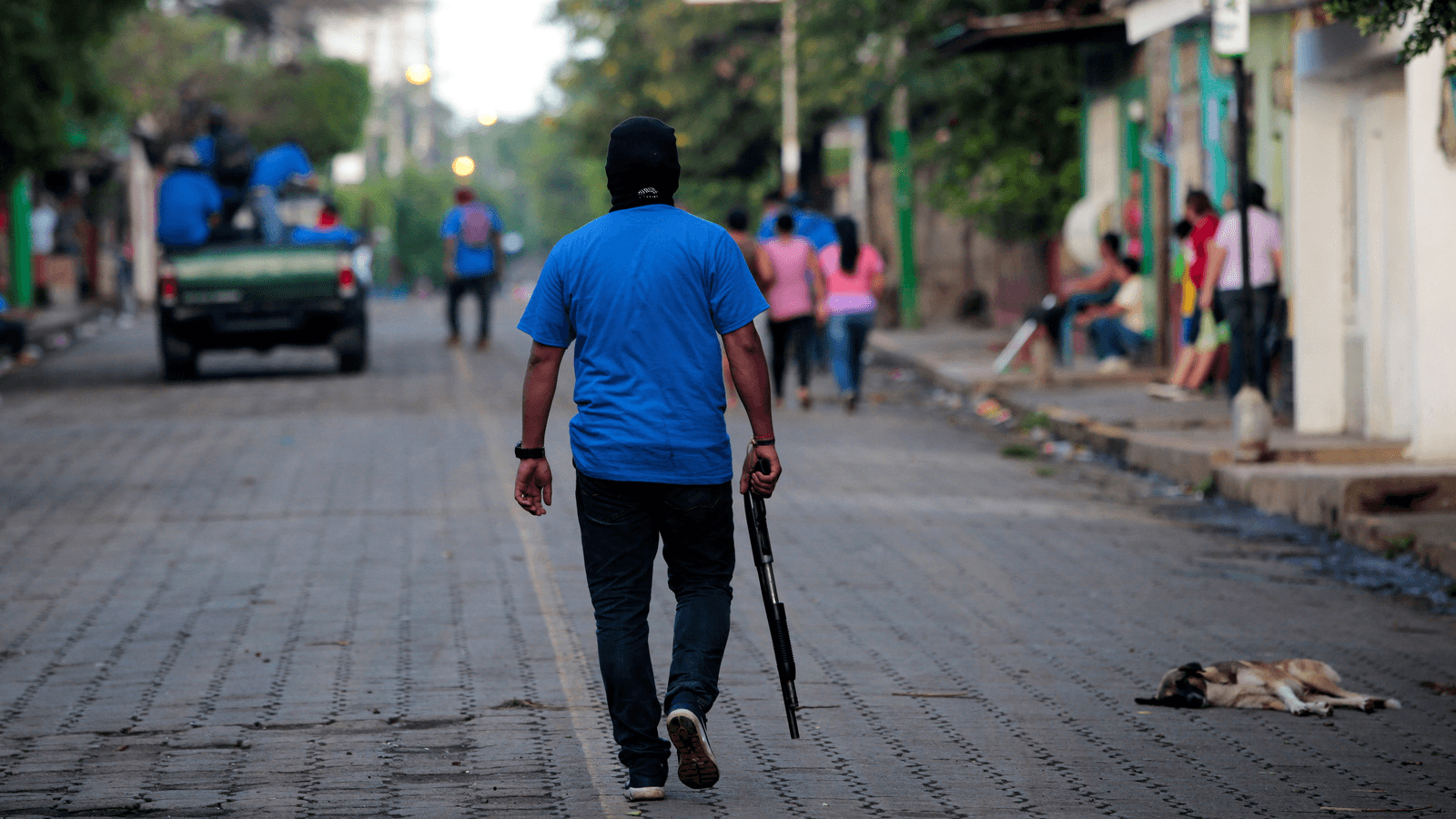 armed government paramilitary man in the streets of Nicaragua