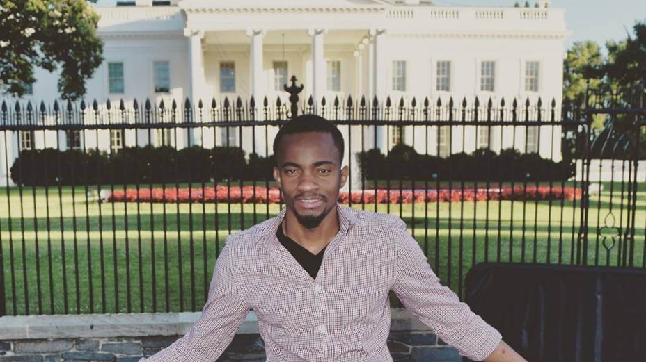 Alex Bukasa, a Congolese asylum-seeker and former journalist, poses in front of the White House. Alex Bukasa, a Congolese asylum-seeker and former journalist, poses in front of the White House.