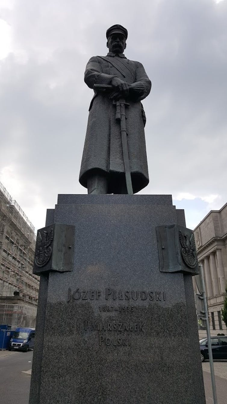 Statue of Józef Piłsudski, first marshal of Poland, in Warsaw. A statue standing outside.