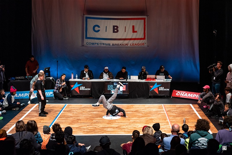 A competitor performs breakdance moves at the Breakdancing Northeast Regionals in suburban Washington, DC, on March 8, 2020. A competitor performs breakdance moves at the Breakdancing Northeast Regionals in suburban Washington, DC, on March 8, 2020.