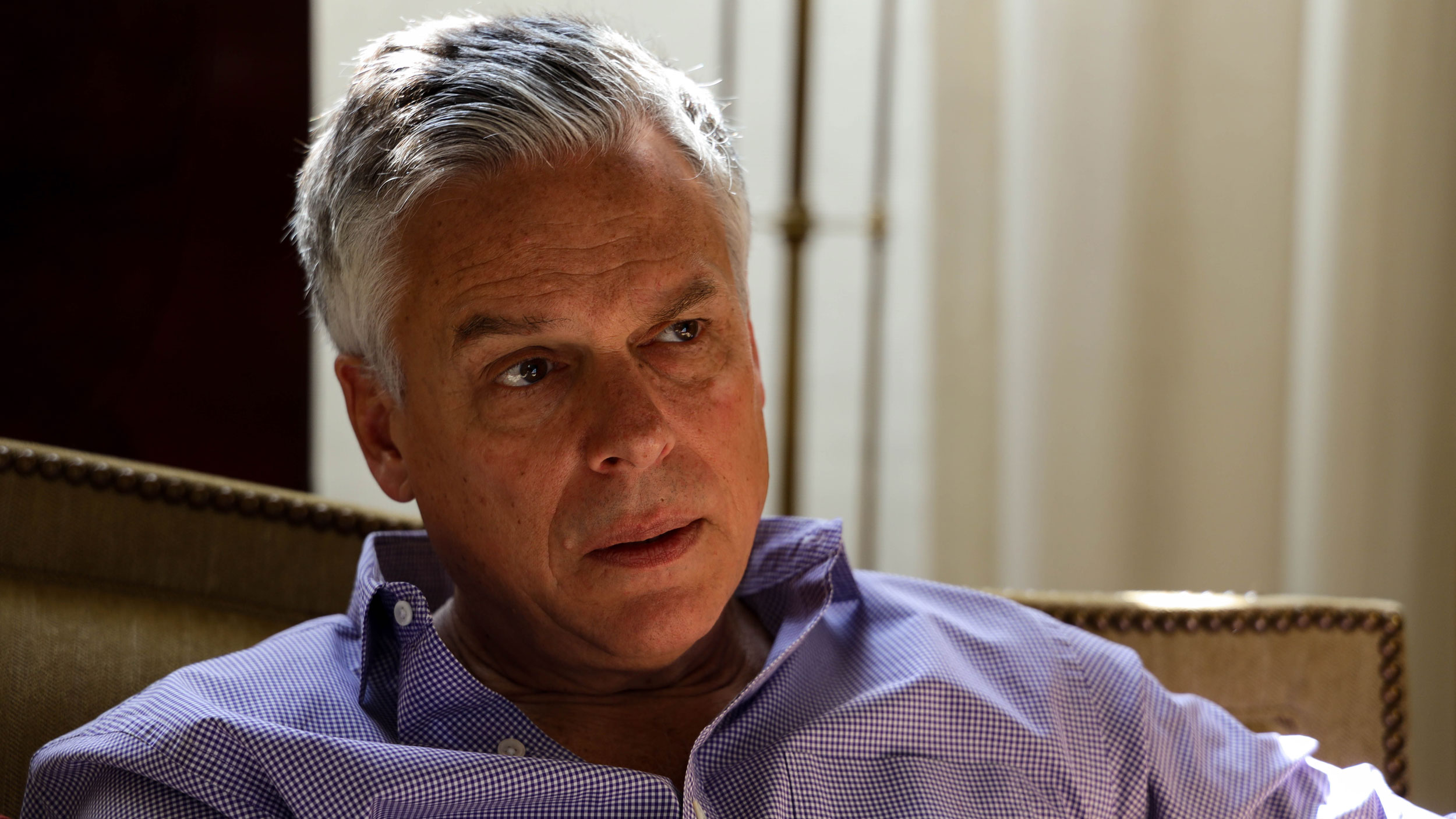 Ambassador Jon Huntsman speaks with The World's Marco Werman in Russia. A portrait photograph of Ambassador Jon Huntsman who is wearing a button down collared shirt.