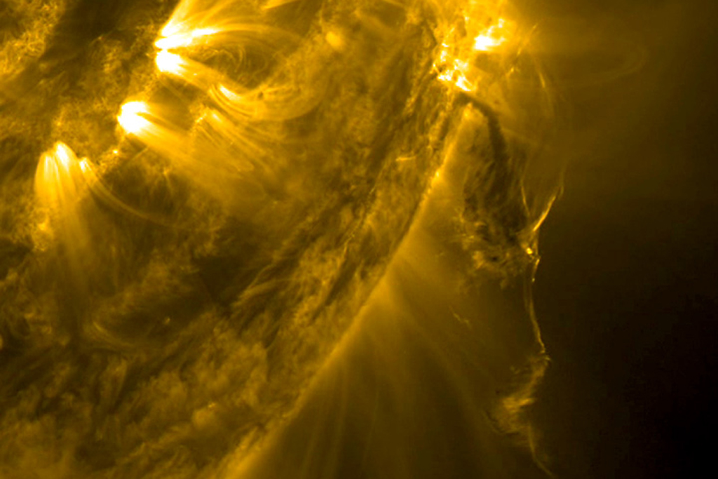 Watch this massive explosion erupt from the surface of the sun - The ...