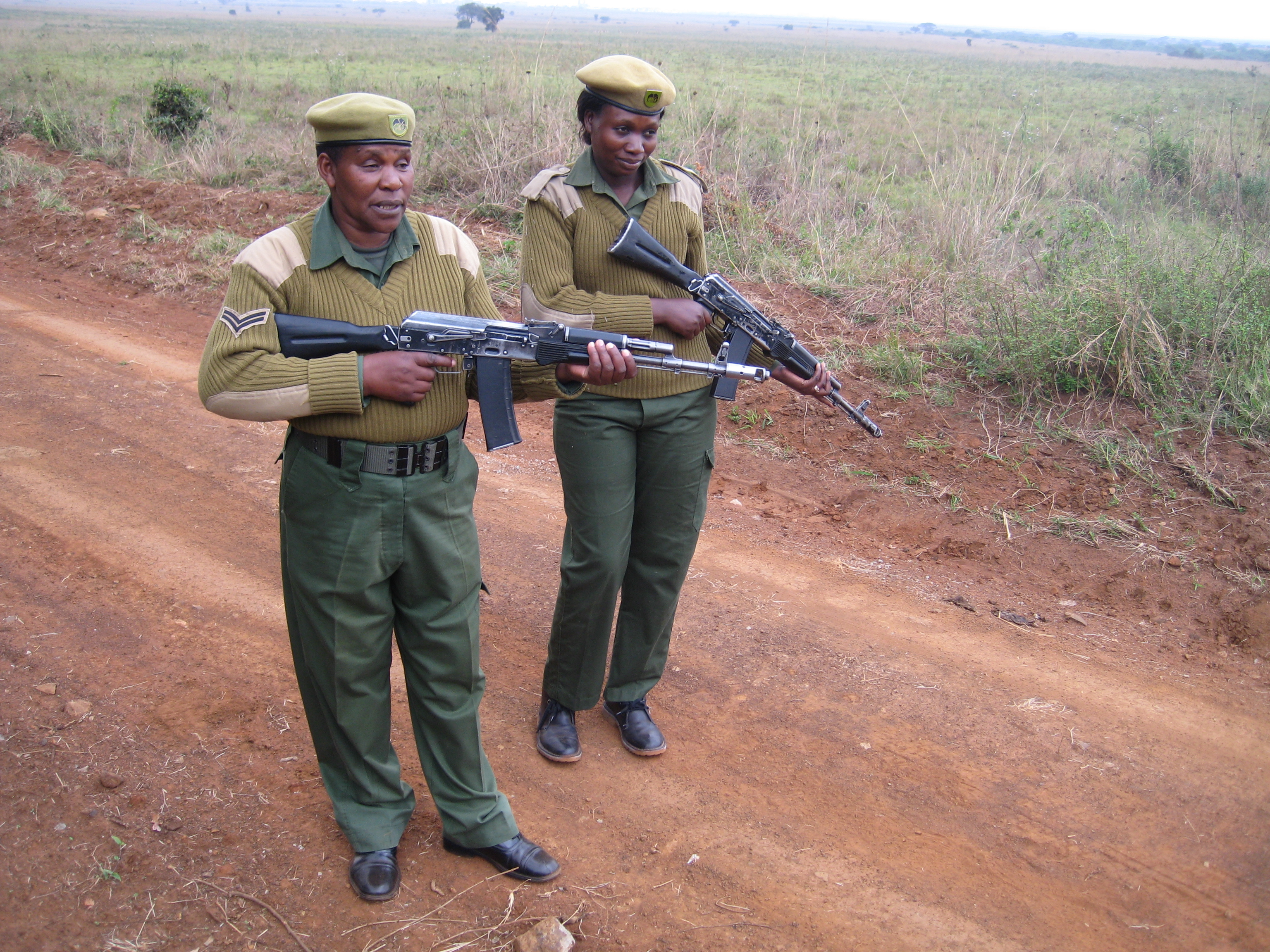 Corporal Patricia Mututu (left), a 30-year Kenya Wildlife Service veteran, and Ranger Mildred Oduor on patrol in Nairobi National Park. Corporal Patricia Mututu (left), a 30-year Kenya Wildlife Service veteran, and Ranger Mildred Oduor on patrol in Nairobi National Park.