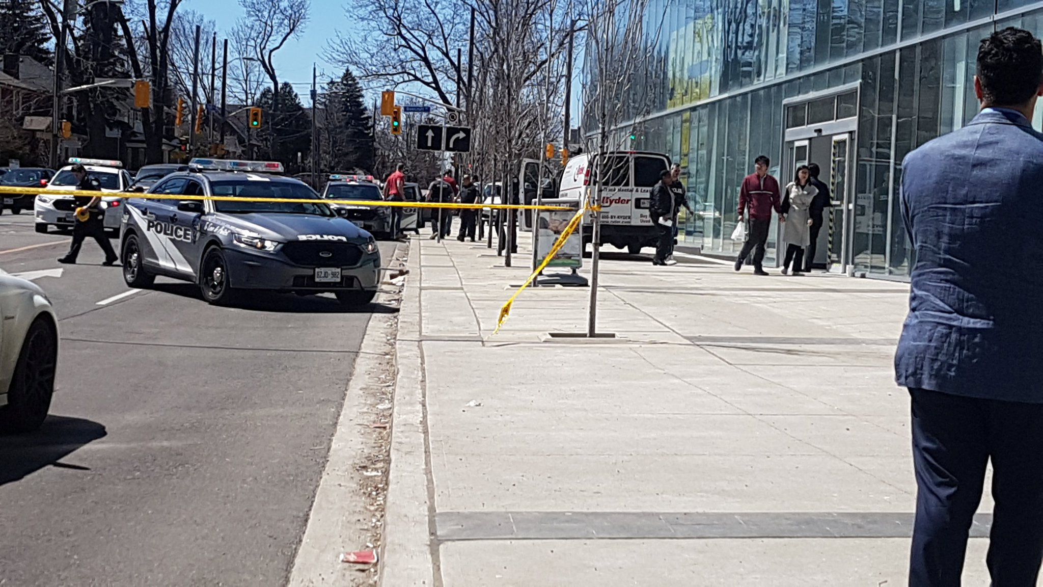 Police officers arrest suspect driver after a van hit multiple people at a major intersection in Toronto, Canada April 23, 2018, in this picture obtained from social media. Police officers arrest suspect driver after a van hit multiple people at a major intersection in Toronto, Canada April 23, 2018, in this picture obtained from social media.