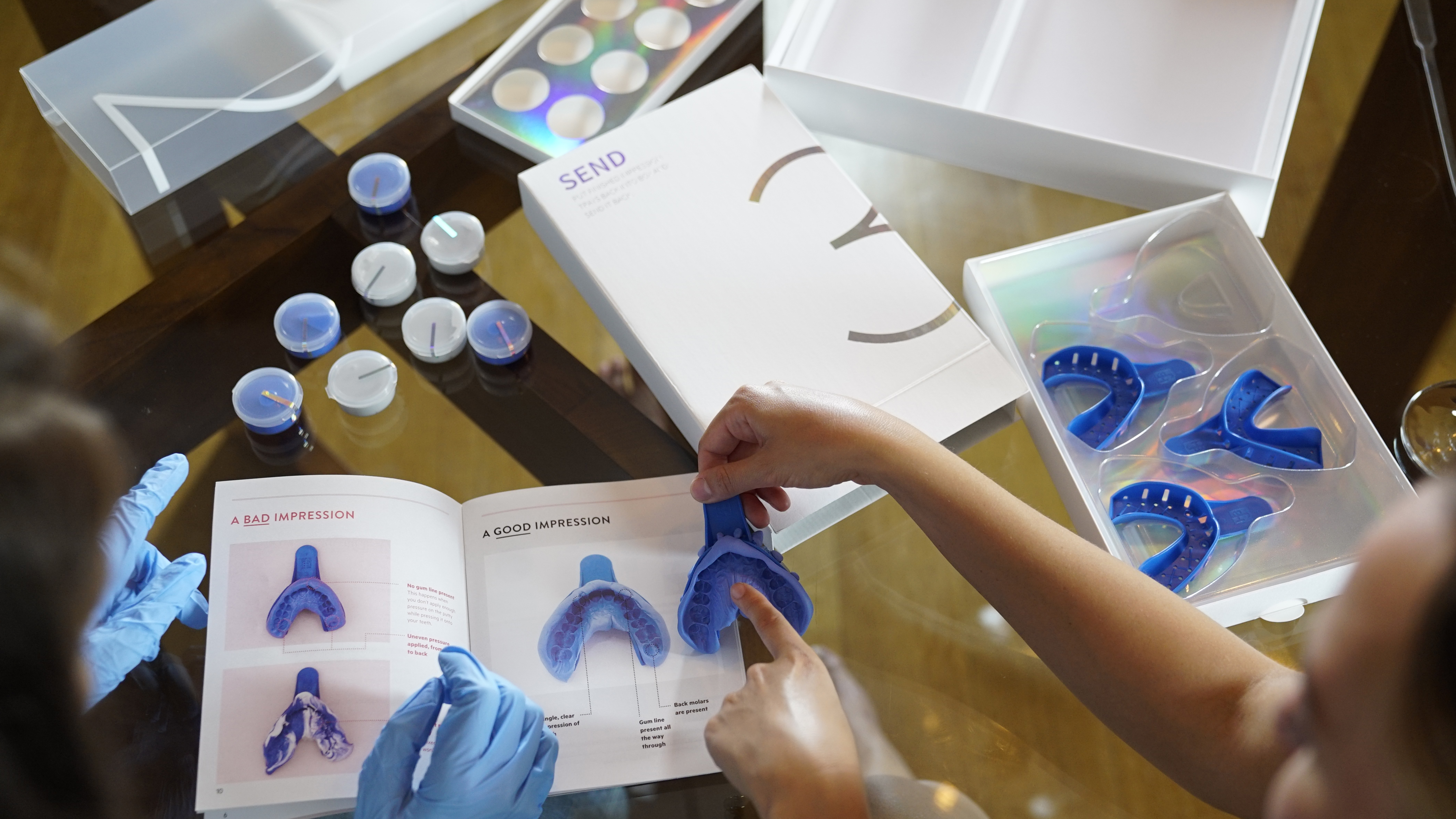Candid Co. sends customers a kit to take impressions of their teeth from home. An orthodontist then remotely comes up with a treatment plan. Candid Co. sends customers a kit to take impressions of their teeth from home. An orthodontist then remotely comes up with a treatment plan.