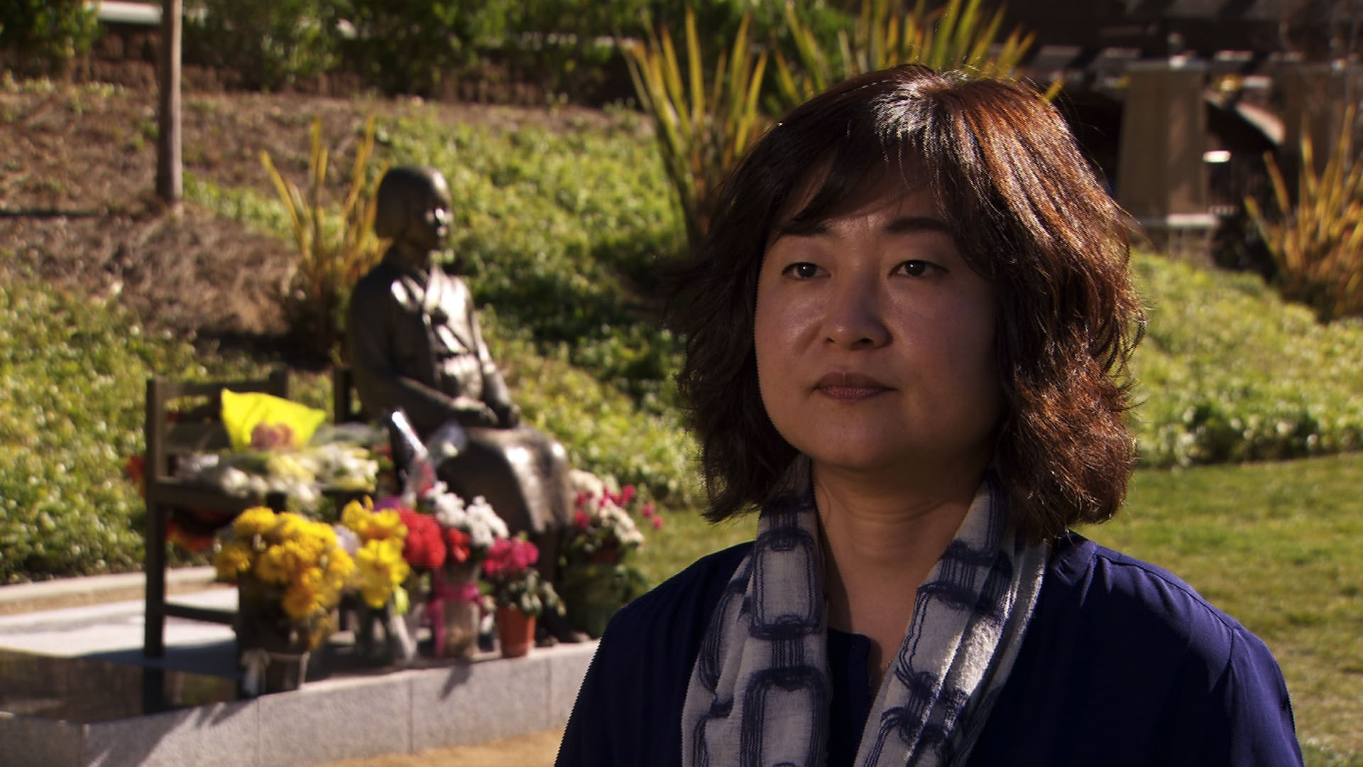 Korean American activist Phyllis Kim at the Glendale, California, memorial for "comfort women." Korean American activist Phyllis Kim at the Glendale, California, memorial for "comfort women."