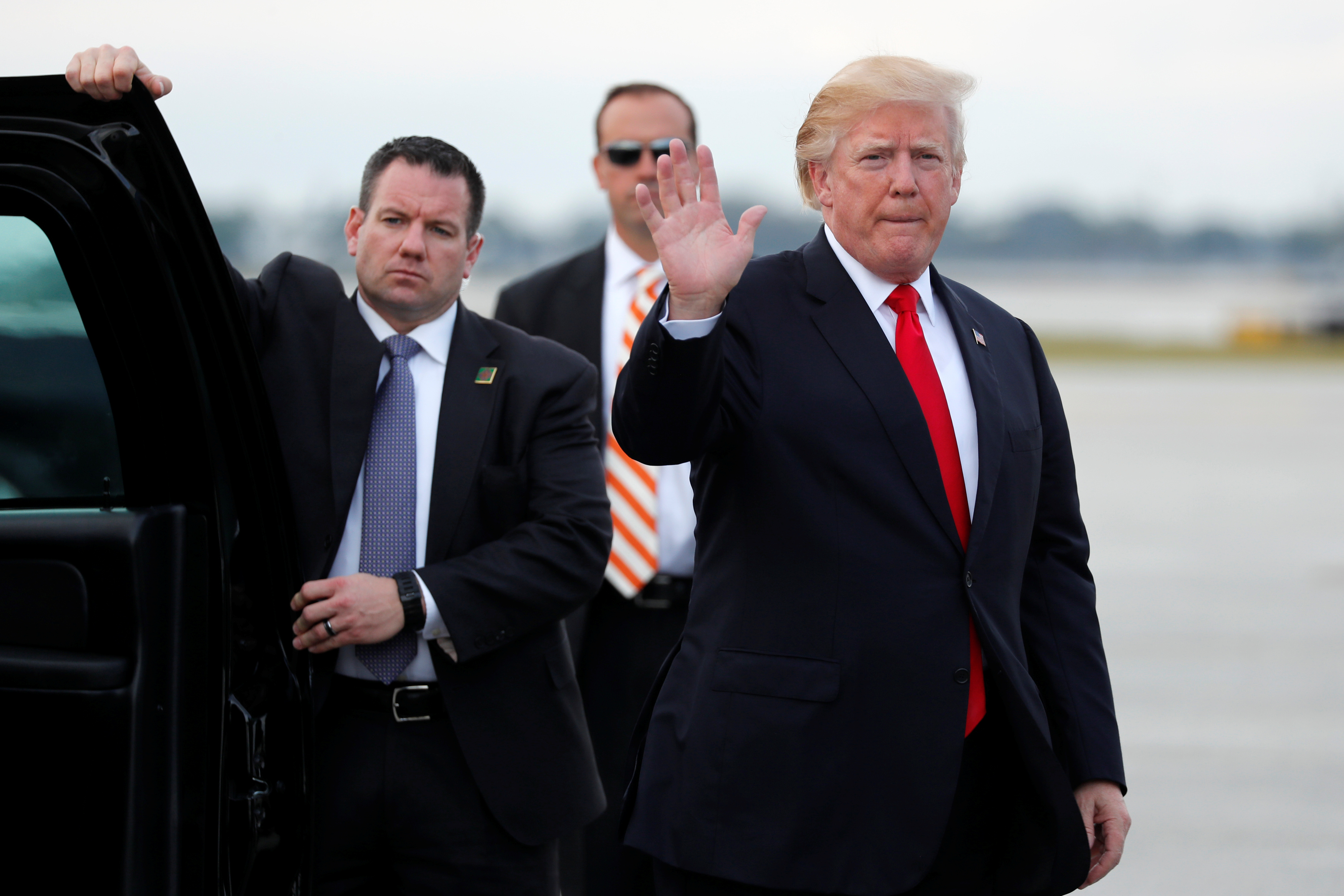 Trump waving