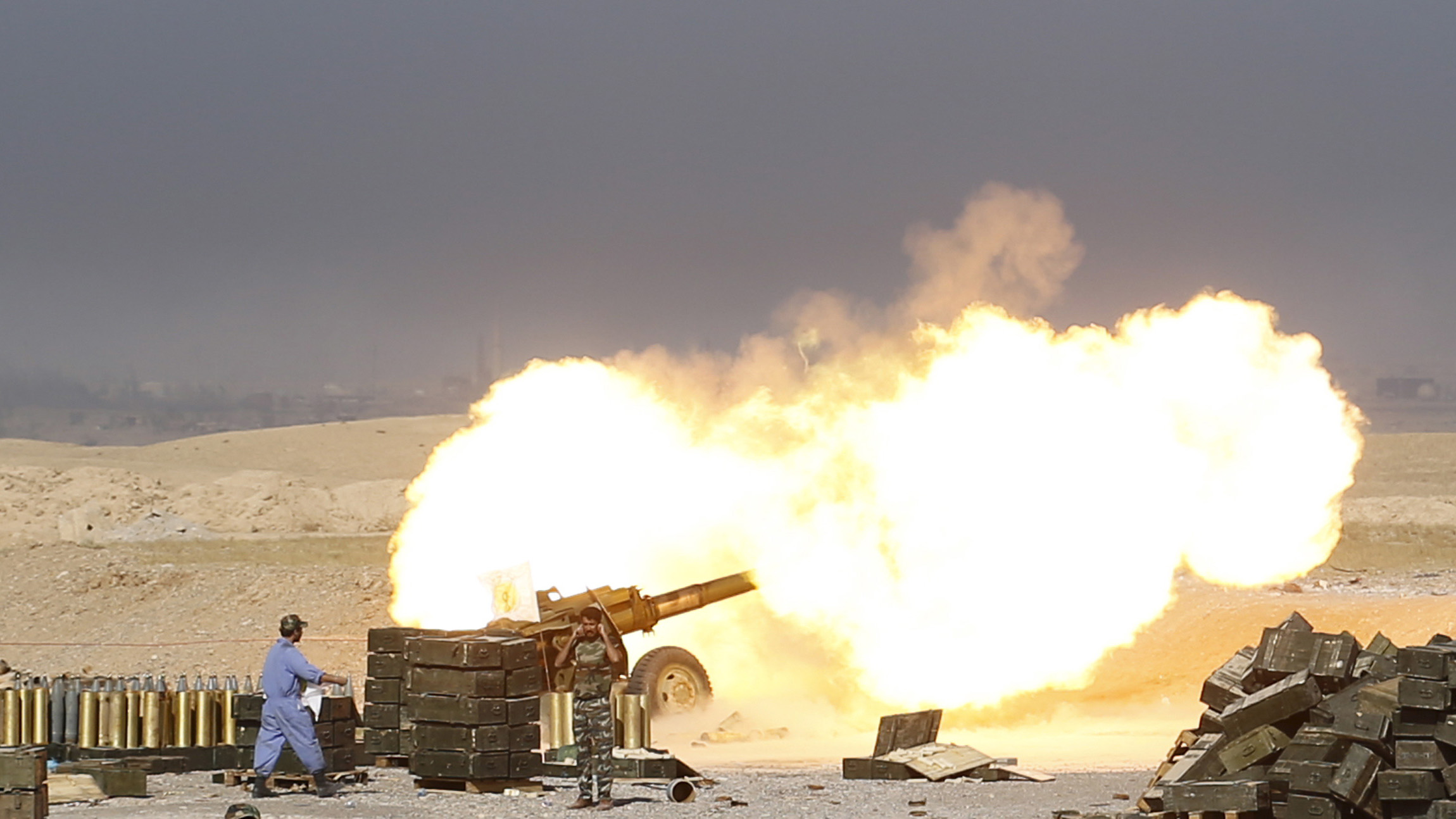 Iran has been training and equipping Shi’ite militias in Iraq for years. Here, Shi’ite militiamen shell ISIS positions near Baiji in 2015 Iran has been training and equipping Shi’ite militias in Iraq for years. Here, Shi’ite militiamen shell ISIS positions near Baiji in 2015