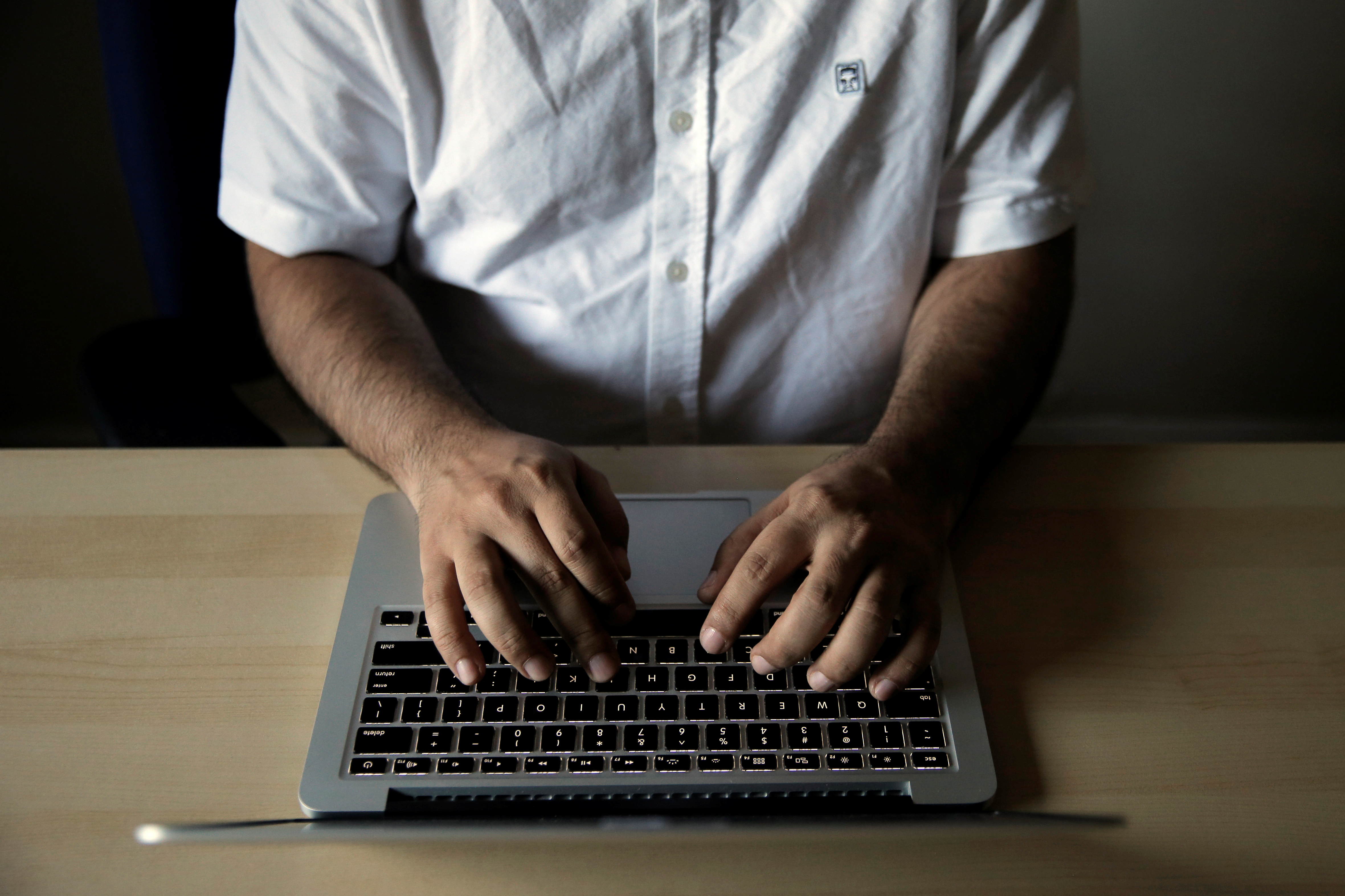 Amir Rashidi, an Internet security researcher who has worked with Telegram users who were victims of hacking, works at the offices of International Campaign for Human Rights in Iran, in the Brooklyn borough of New York, U.S., July 27, 2016. 