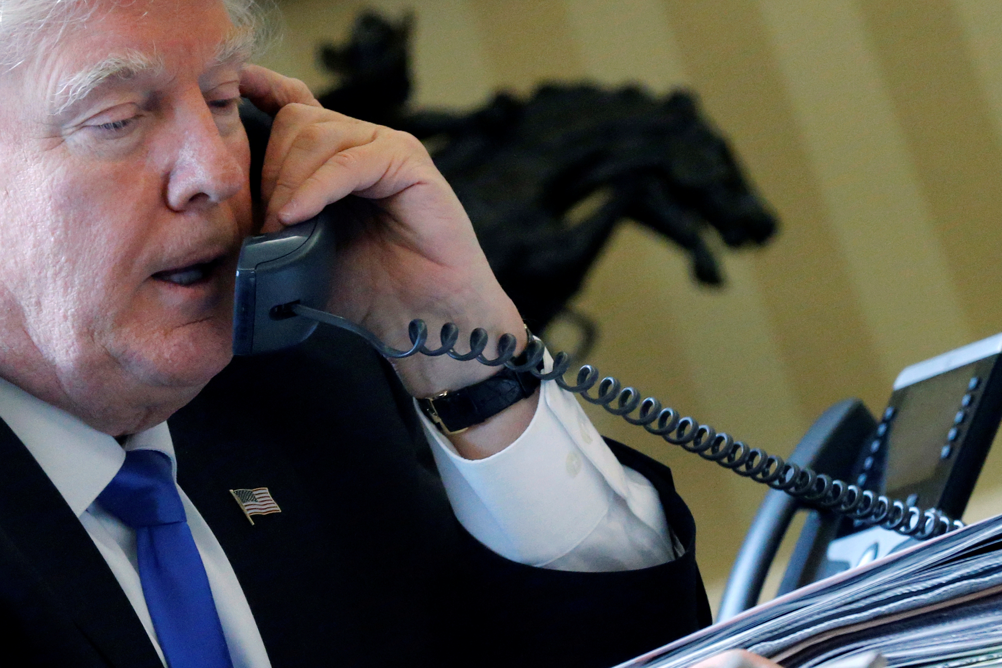 US President Donald Trump speaks by phone with Russia's President Vladimir Putin US President Donald Trump speaks by phone with Russia's President Vladimir Putin