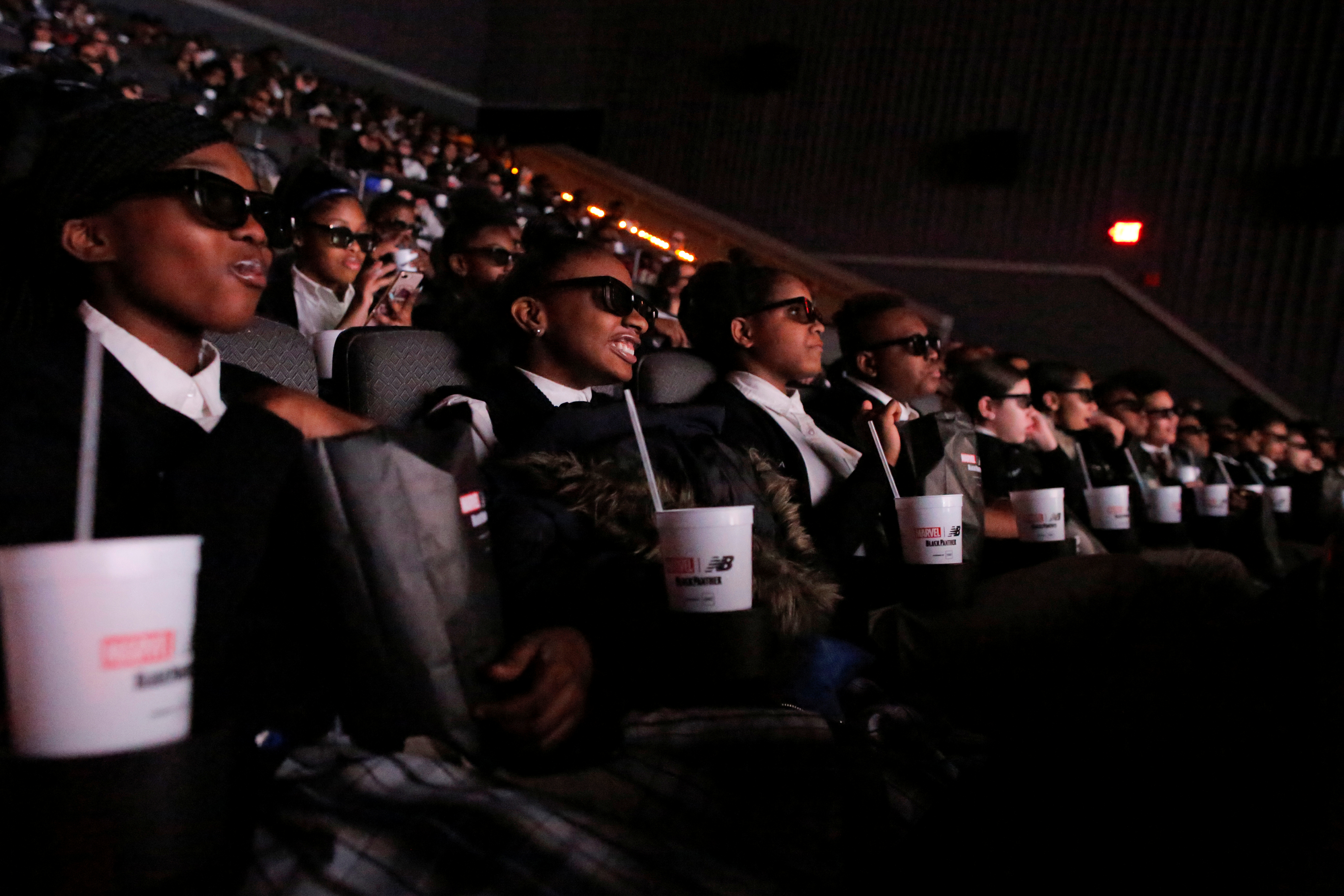 Students from the Capital Preparatory Harlem School watch a screening of the film "Black Panther" on its opening night. Students from the Capital Preparatory Harlem School watch a screening of the film "Black Panther" on its opening night.