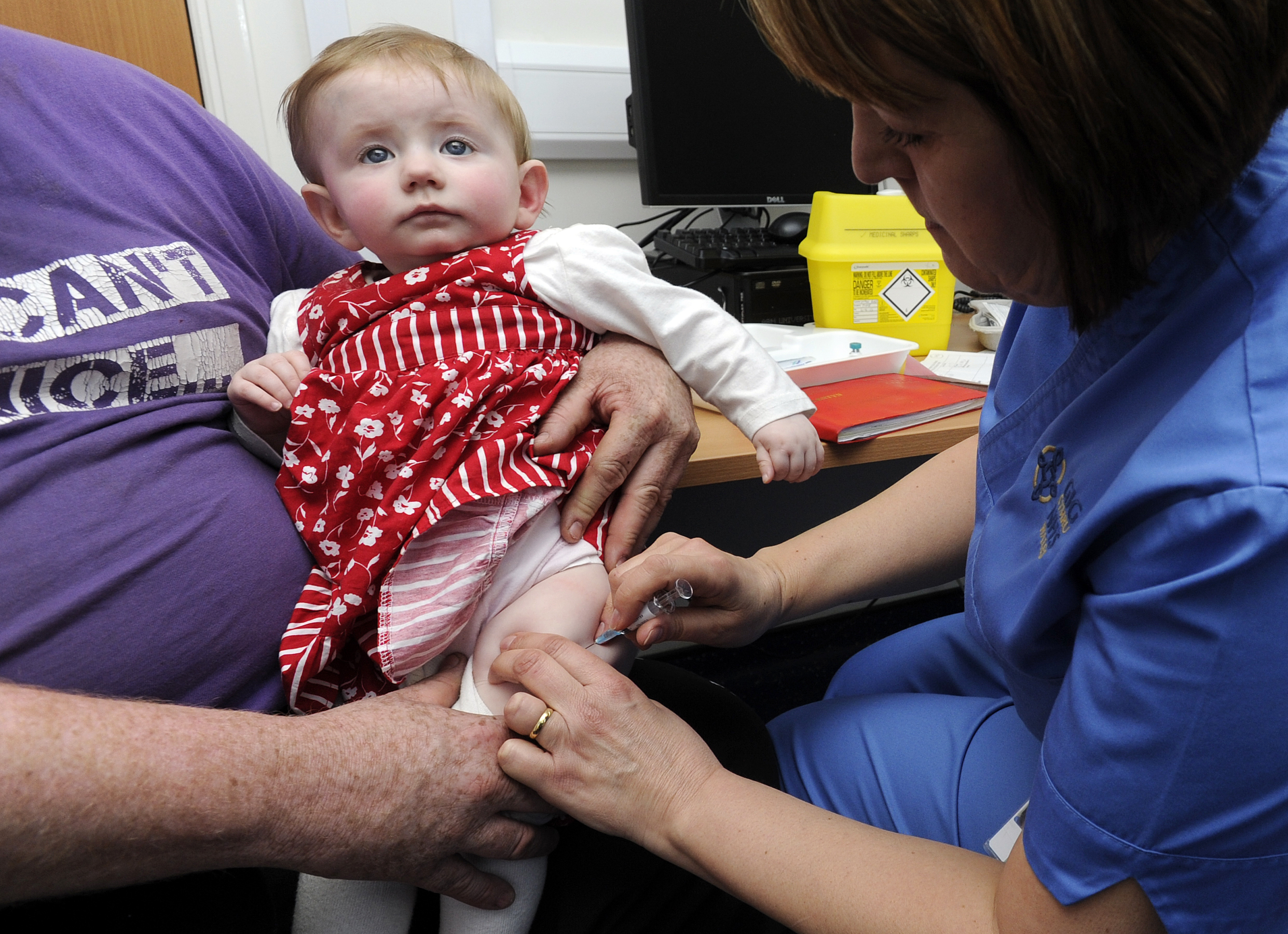 Ten-month old Lauren Durbin receives an injection for measles, mumps and rubella. Typically children do not receive the MMR vaccine until they are 12 months old. Ten-month old Lauren Durbin receives an injection for measles, mumps and rubella. Typically children do not receive the MMR vaccine until they are 12 months old.