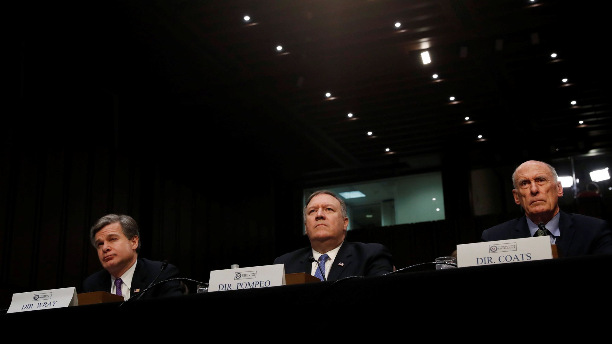 FBI Director Christopher Wray, CIA Director Mike Pompeo and Director of National Intelligence Dan Coats testify before a Senate Intelligence Committee hearing on "World Wide Threats" in Washington, Feb. 13, 2018. FBI Director Christopher Wray, CIA Director Mike Pompeo and Director of National Intelligence Dan Coats testify before a Senate Intelligence Committee hearing on "World Wide Threats" in Washington, Feb. 13, 2018.