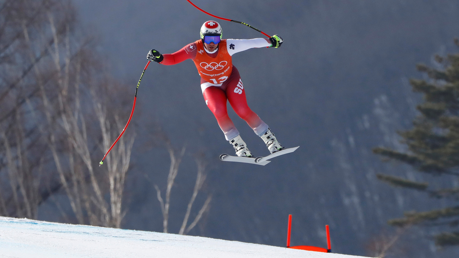 Beat Feuz of Switzerland takes a jump during the second training run for the men's downhill of the Pyeongchang 2018 Winter Olympic Games at the Jeongseon Alpine Centre in Pyeongchang, South Korea, Feb. 9, 2018.