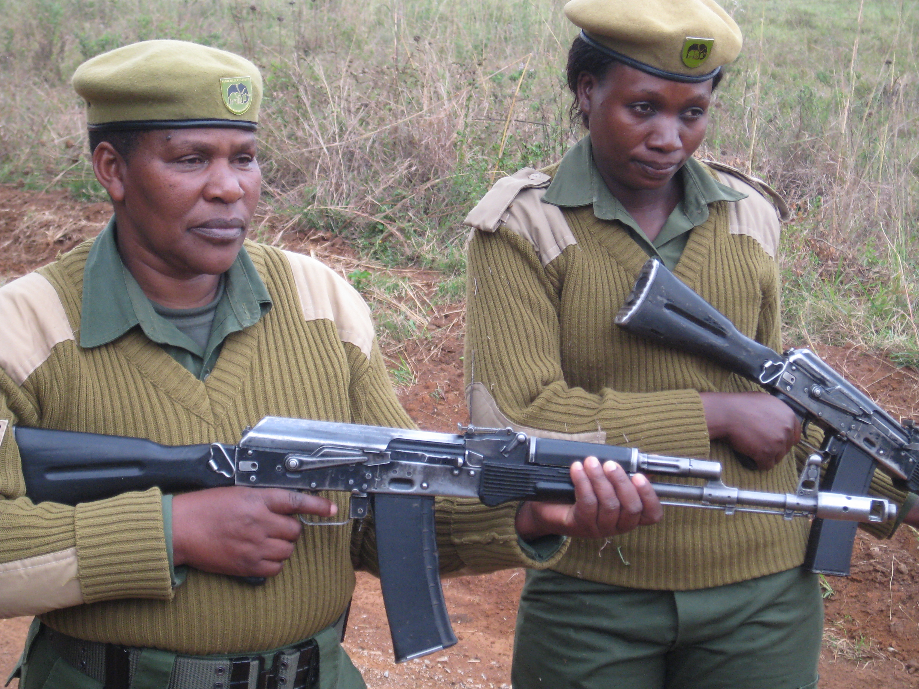 Corporal Patricia Mututu (left), a 30-year Kenya Wildlife Service veteran, and Ranger Mildred Oduor on patrol in Nairobi National Park. Hundreds of Kenya Wildlife Service rangers have been shot by poachers in the last three years; 13 have been killed. Corporal Patricia Mututu (left), a 30-year Kenya Wildlife Service veteran, and Ranger Mildred Oduor on patrol in Nairobi National Park. Hundreds of Kenya Wildlife Service rangers have been shot by poachers in the last three years; 13 have been killed.