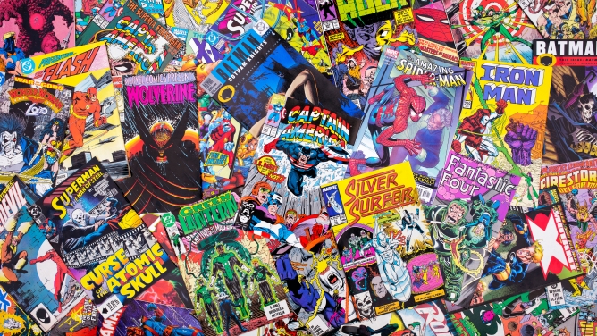 A pile of Marvel and DC comics. A pile of Marvel and DC comics.