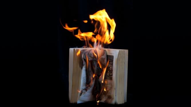 A book on fire. A book on fire.