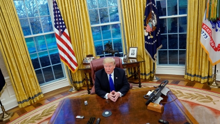 President Donald Trump answers questions during an exclusive interview with Reuters journalists in the Oval Office at the White House in Washington,  DC on December 11, 2018. Asked about his past business connections with Russia, Trump said, 