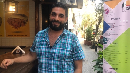 Firas Yordi, a Venezuelan of Lebanese descent, in front of his new restaurant in Beirut. He returned to his parents' homeland last year amidst Venezuela's financial crisis. 