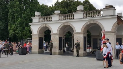 Soldiers guarding a tomb outside in Poland. 