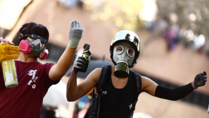 Protesters in Hong Kong wearing gas masks. 