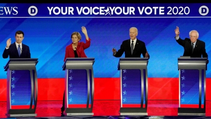 Democratic 2020 US presidential candidates (left to right) former South Bend Mayor Pete Buttigieg, Senator Elizabeth Warren, former Vice President Joe Biden and Senator Bernie Sanders participate in the eighth Democratic 2020 presidential debate. 