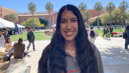 Adela Diaz, who will be a first-time voter in 2020, poses on her campus at the University of Arizona in Tucson.