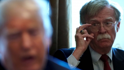 Then-National Security Adviser John Bolton listens as US President Donald Trump holds a Cabinet meeting at the White House in Washington, DC, on April 9, 2018.