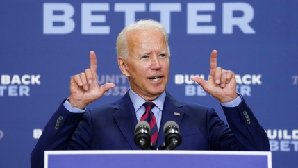 Democratic US presidential nominee and former Vice President Joe Biden answers questions from reporters after a speech about the effects on the economy of the Trump administration's response to the coronavirus during an appearance in Wilmington, Del., Sep
