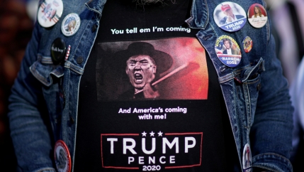 A supporter of US President Donald Trump waits for the election results as votes continue to be counted following the 2020 presidential election, in Philadelphia, Pennsylvania, Nov. 6, 2020.