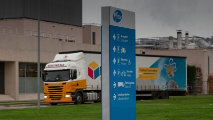 A truck leaves Pfizer Manufacturing in Puurs, Belgium, Dec. 2, 2020.