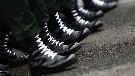 Former rebel fighters parade during a ceremony at Nepalese Military Academy in Kharipati, Nepal, Aug. 26, 2013.