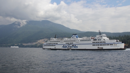 A ferry moves through British Colombia waters. 
