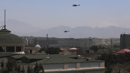 US Black Hawk military helicopters fly over the city of Kabul, Afghanistan, April 19, 2021.