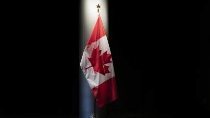 The Canadian flag is illuminated in the Embassy of Canada in Washington in Washington, Thursday, June 20, 2019. 