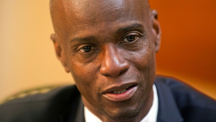 Haiti's President Jovenel Moise speaks during an interview at his home in Petion-Ville, a suburb of Port-au-Prince, Haiti