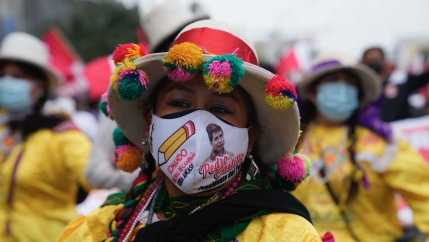 People march in support of presidential candidate Pedro Castillo weeks after the presidential runoff election, in Lima, Peru, June 26, 2021. With all the votes tallied from the June 6th presidential runoff, Castillo is ahead of his rival candidate Keiko F
