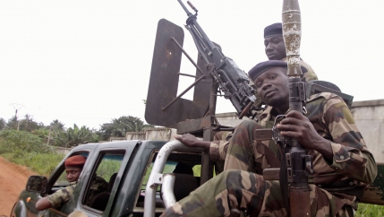 In this Monday, Aug. 6, 2012, file photo, Côte d’Ivoire troops patrol in the Cocody area of Abidjan, Côte d’Ivoire. 