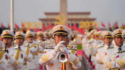 A military band rehearses for a ceremony to mark the 100th anniversary of the founding of the ruling Chinese Communist Party at Tiananmen Gate in Beijing, July 1, 2021. Chinese fighter jets, anti-submarine aircraft and combat ships conducted assault drill
