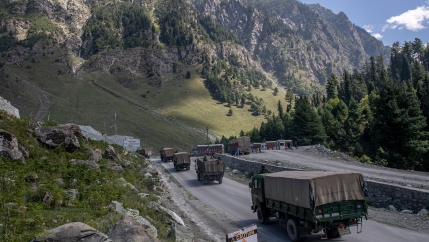 An Indian army convoy moves on the Srinagar- Ladakh highway at Gagangeer, northeast of Srinagar, Indian-controlled Kashmir