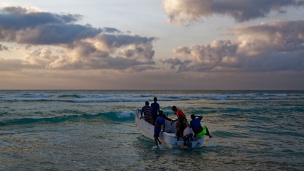In this photo taken Tuesday, March 7, 2017, fishermen set out for their day's work in the Indian Ocean shortly after dawn in the former pirate village of Eyl, in Somalia's semiautonomous northeastern state of Puntland. 