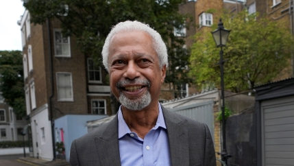 Zanzibar-born writer Abdulrazak Gurnah, winner of the 2021 Nobel prize for literature, smiles ahead of a press conference in London, Friday, Oct. 8, 2021.
