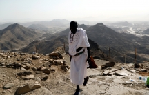 A muslim pilgrim climbs Mount Al-Noor