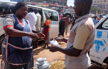 selling grasshoppers for food in Uganda 